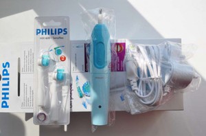 Качественная современная зубная щетка Philips - электрический прибор